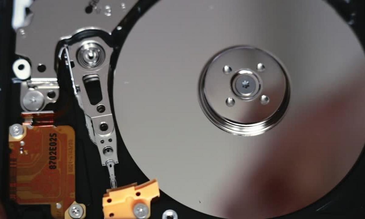 How to open the disk drive on the laptop without button?