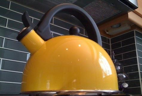 How to clean a teapot from a scum?