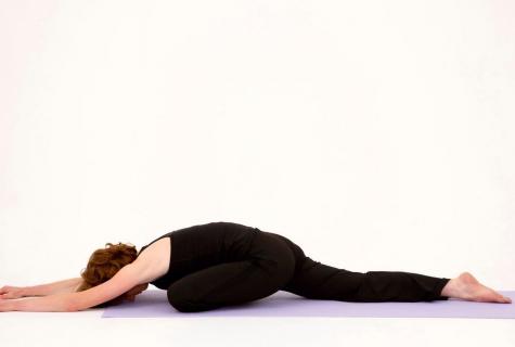 Pose of a pigeon in yoga: advantage of an asana and rule of its performance
