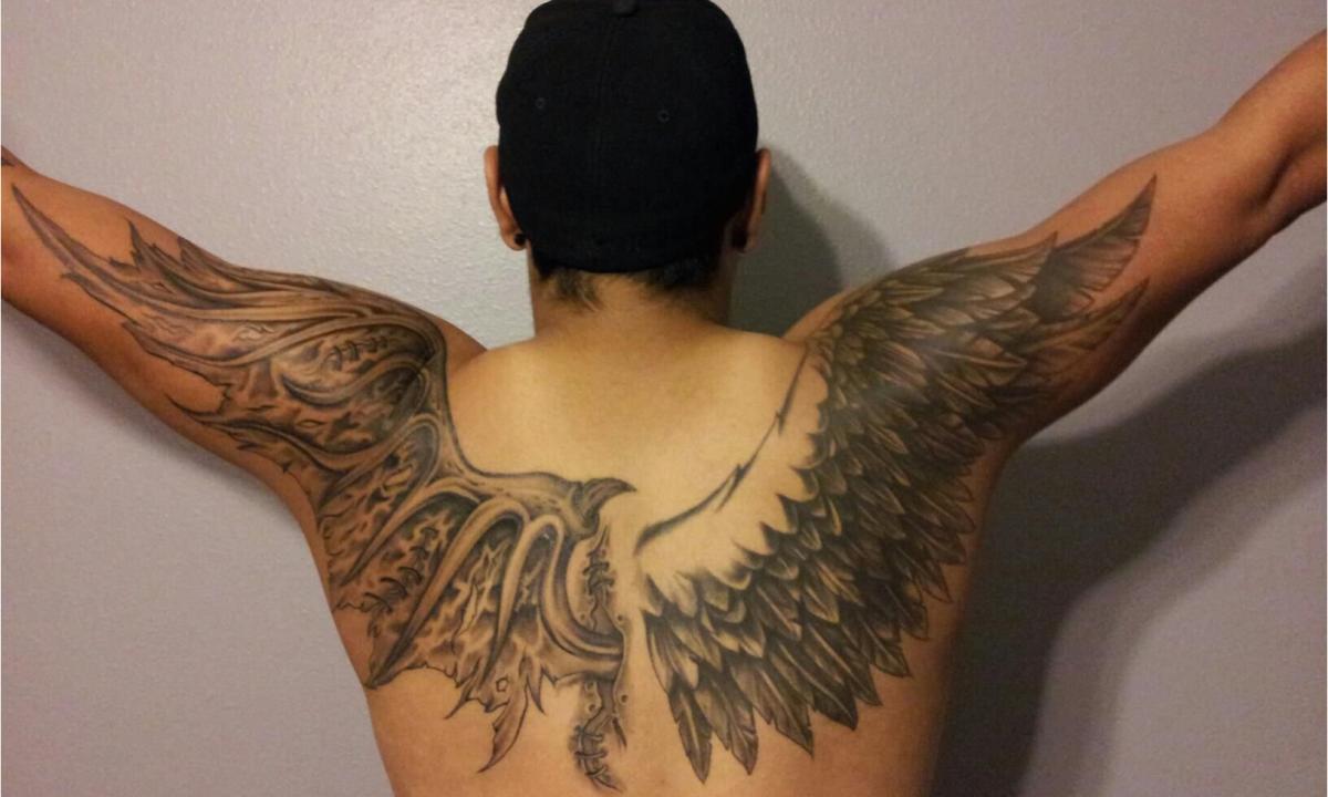 What is meant by tattoo - crown with wings?