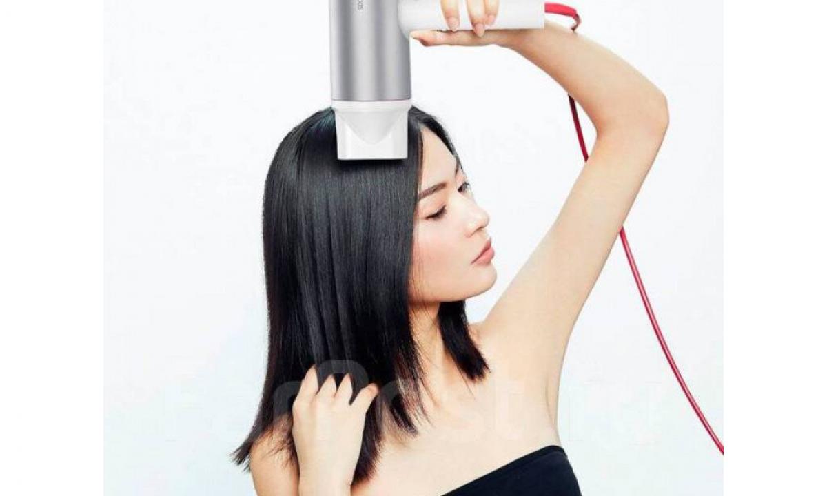 Why function of ionization in the hair dryer is necessary