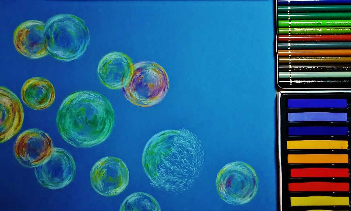 As to draw with acrylic paints on marigold soap bubbles