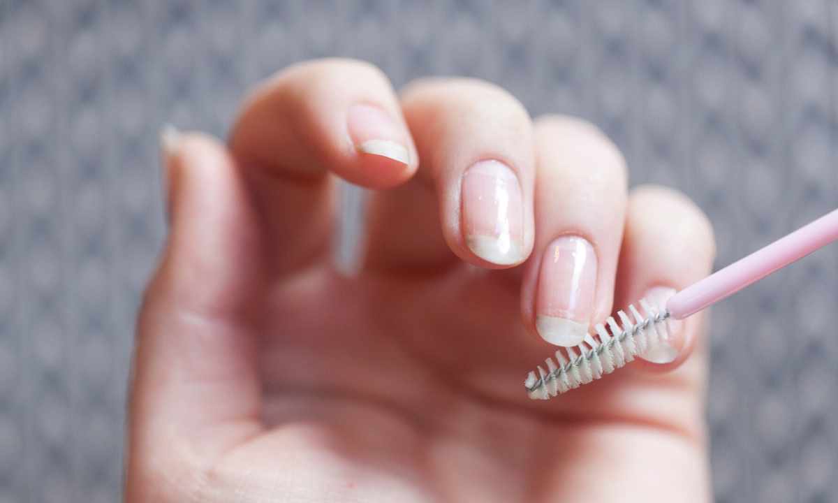 How to remove dirt from under nails standing