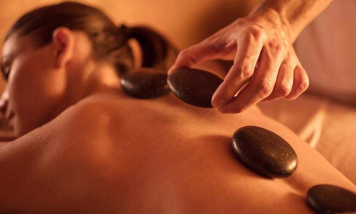 Massage by hot stones - advantage and contraindications