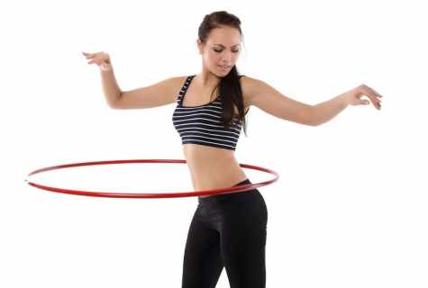 How to reduce the waist by means of the hoop