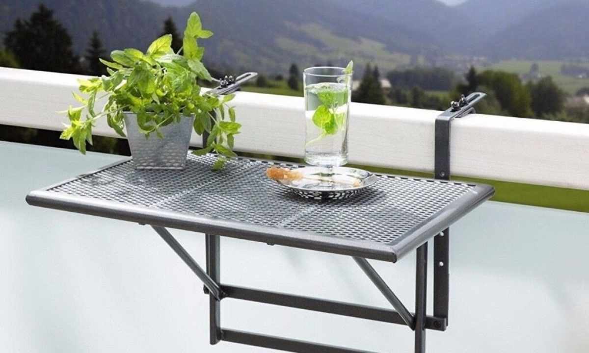 Folding table for balcony: features and advantages