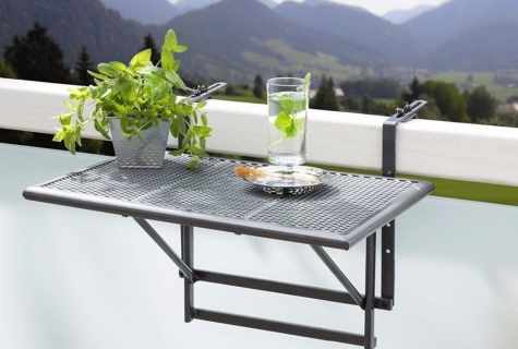 Folding table for balcony: features and advantages