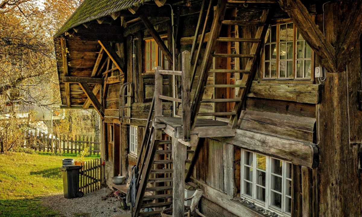 Than to warm old wooden house outside