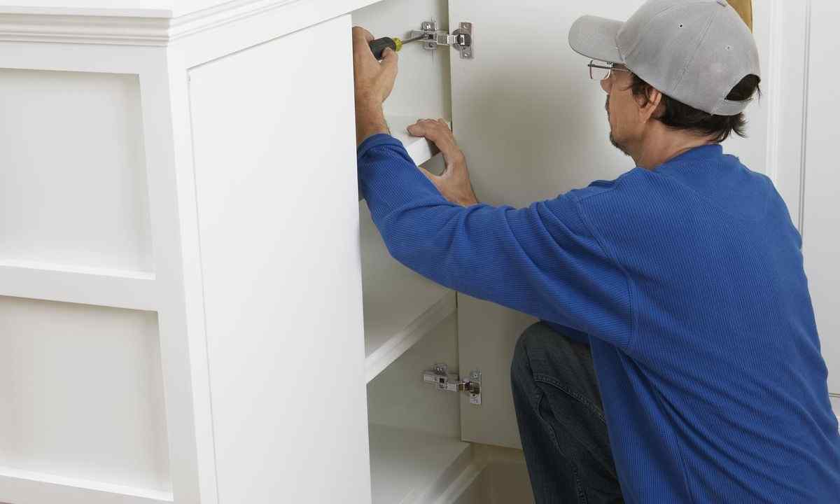 How to fix cabinets on wall
