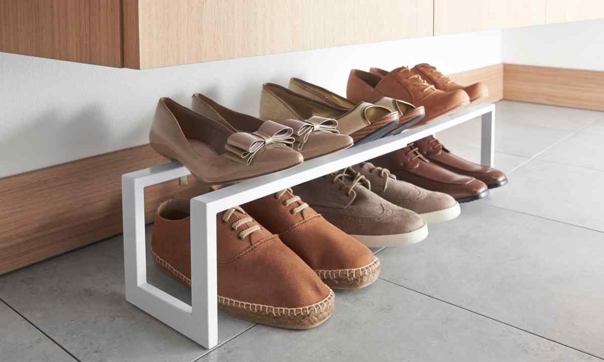 Stylish hall furniture: the rack for footwear