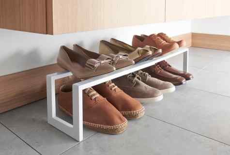 Stylish hall furniture: the rack for footwear