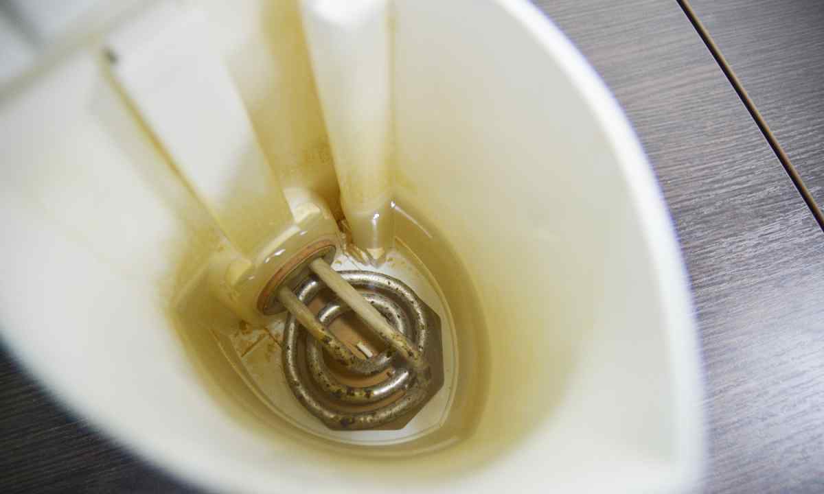 How to remove scum from the electric kettle