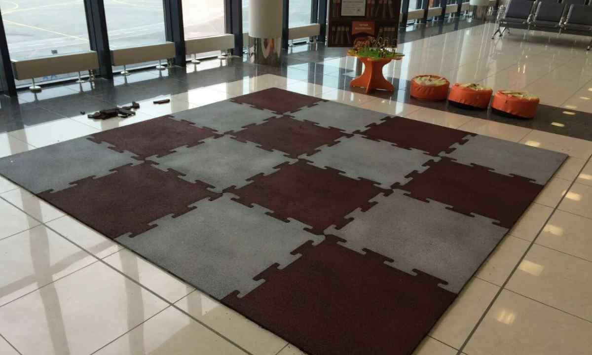 Floor modular tile of PVC