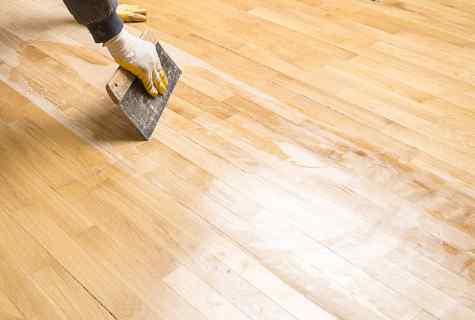 Grinding and painting of wooden floor