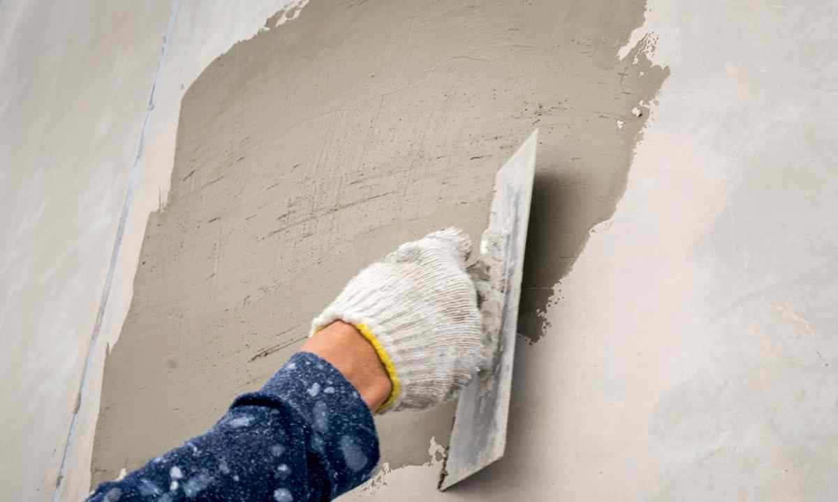 How to apply solution for plaster of walls from foam concrete blocks