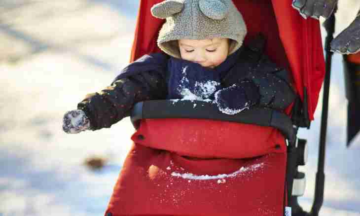How to dress the baby in the winter