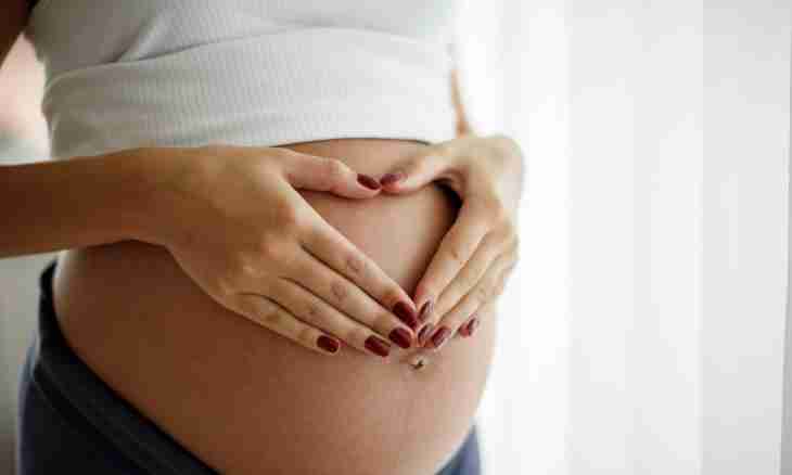 What shape of a stomach at pregnancy by the boy