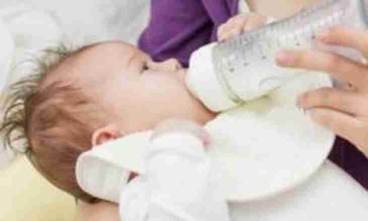 Alcohol intake during feeding by a breast