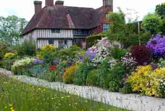 Day regimen in a garden and houses