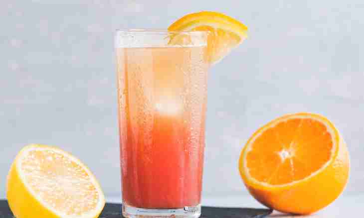 Orange cold fruit punch with champagne