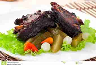The pork ribs baked with vegetables