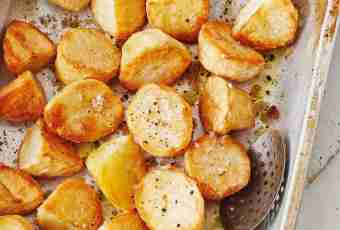 How to bake fragrant potato with parmesan and garlic