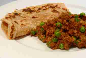 The Indian flat cakes Parathat with green peas